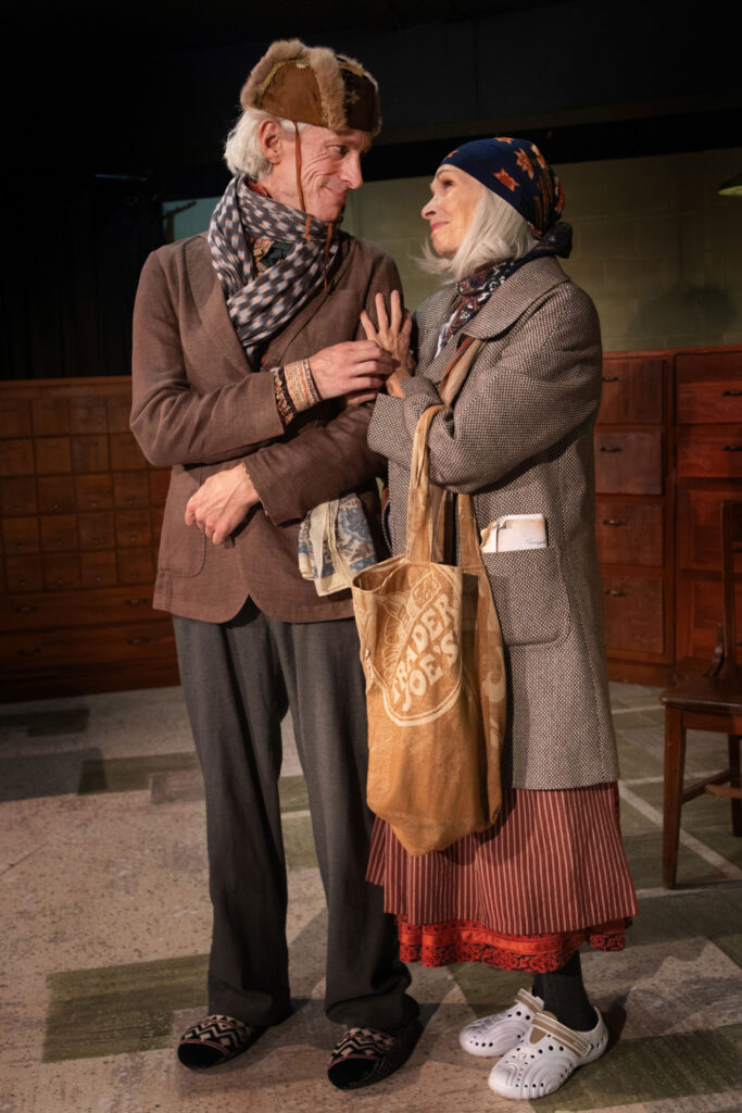 Jeff Broitman as Resten and Ellen Shaw as Alta embrace in The Language Archive